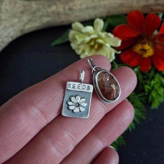 Sunstone Charm and Flower Seed Packet Charm